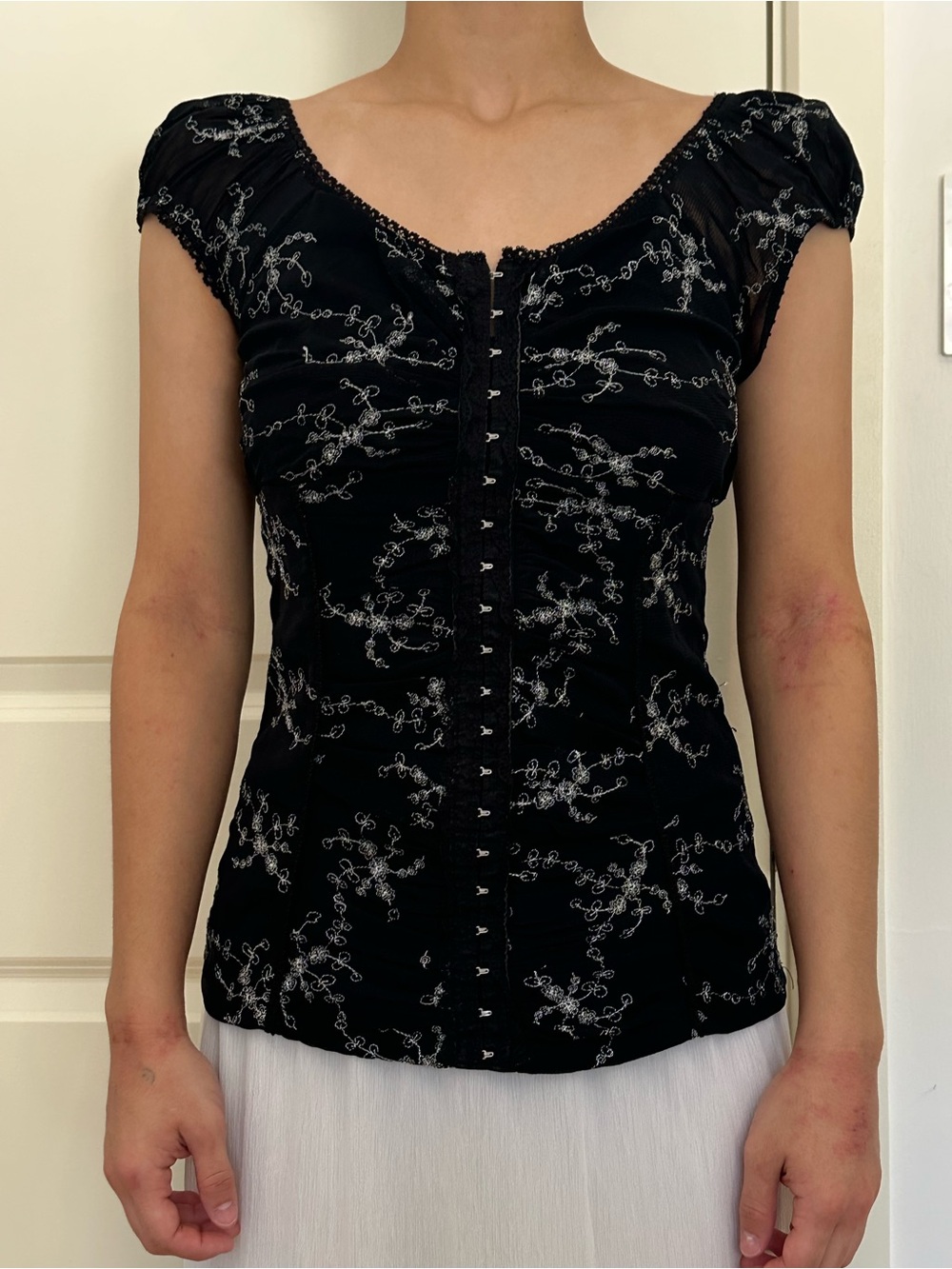 le chateau Black Cap-Sleeve corset style top with silver embroidery